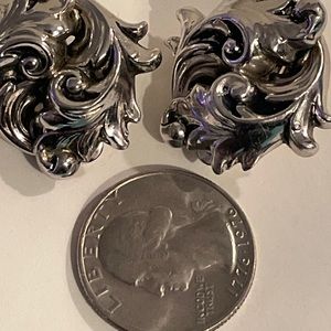 Near mint Whiting and Davis silvertone scroll earrings, clip on style. Signed.